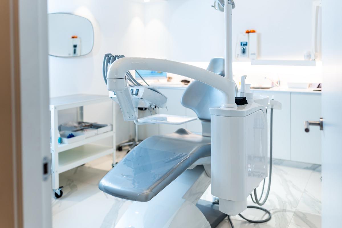 Doctor consulting warmly with patient