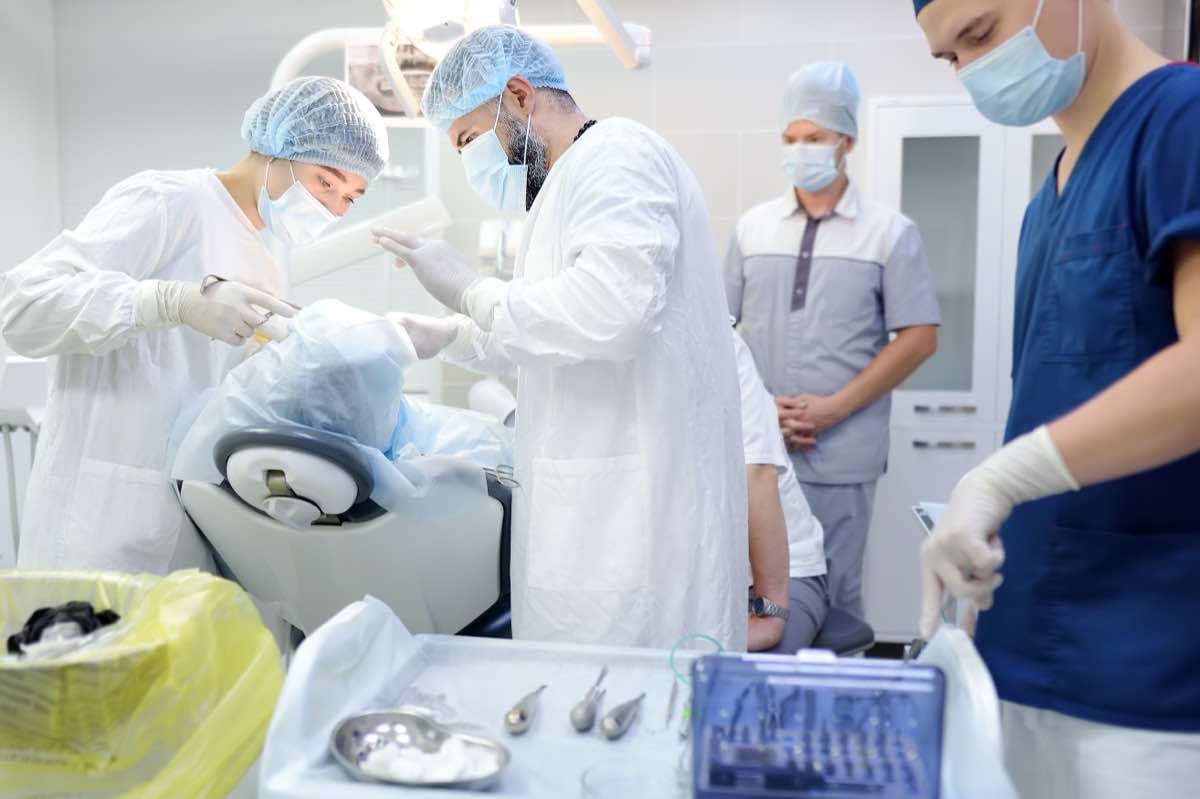 Patient speaking with a dental team member